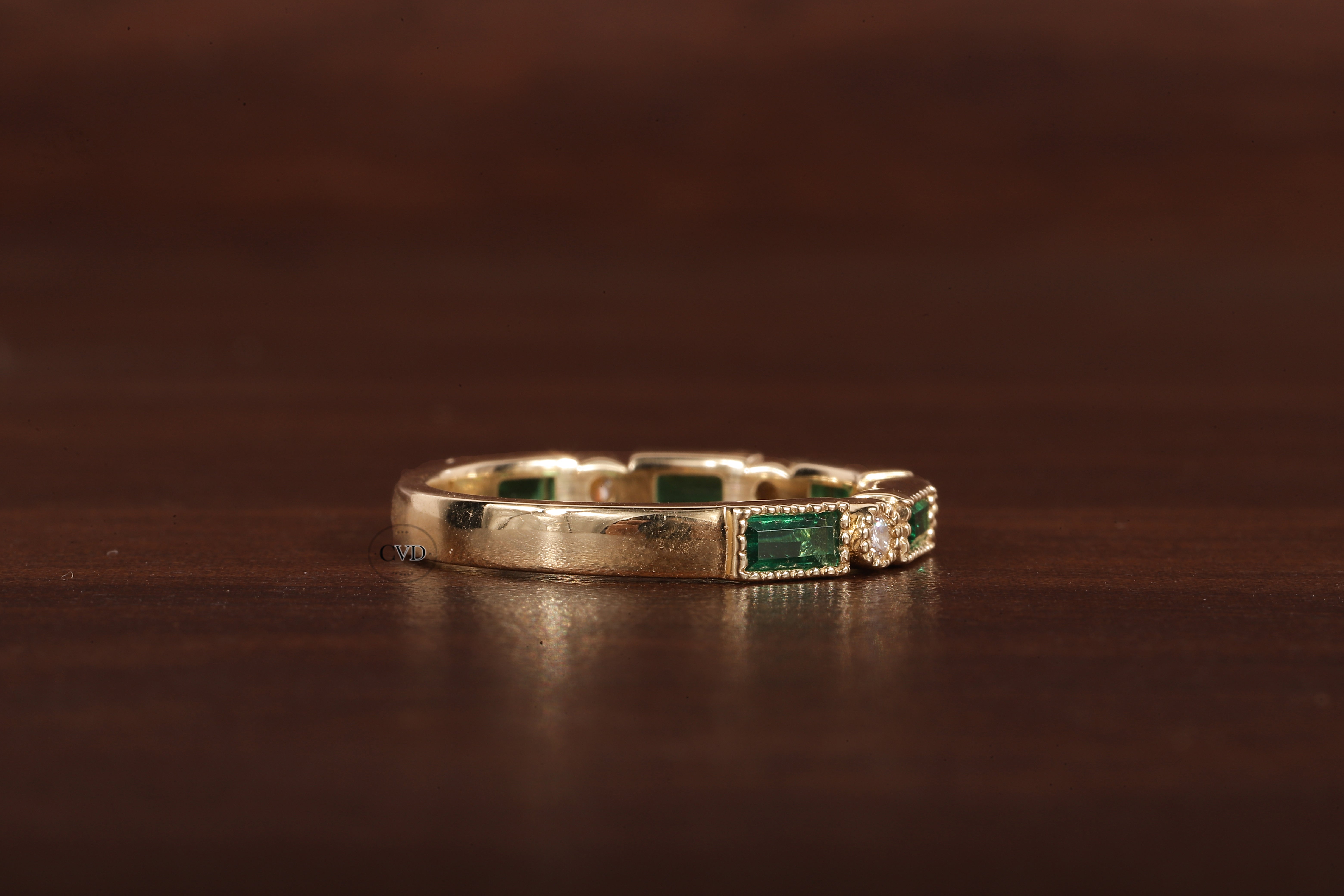 Green baguette and round moissanite milgrain bezel set