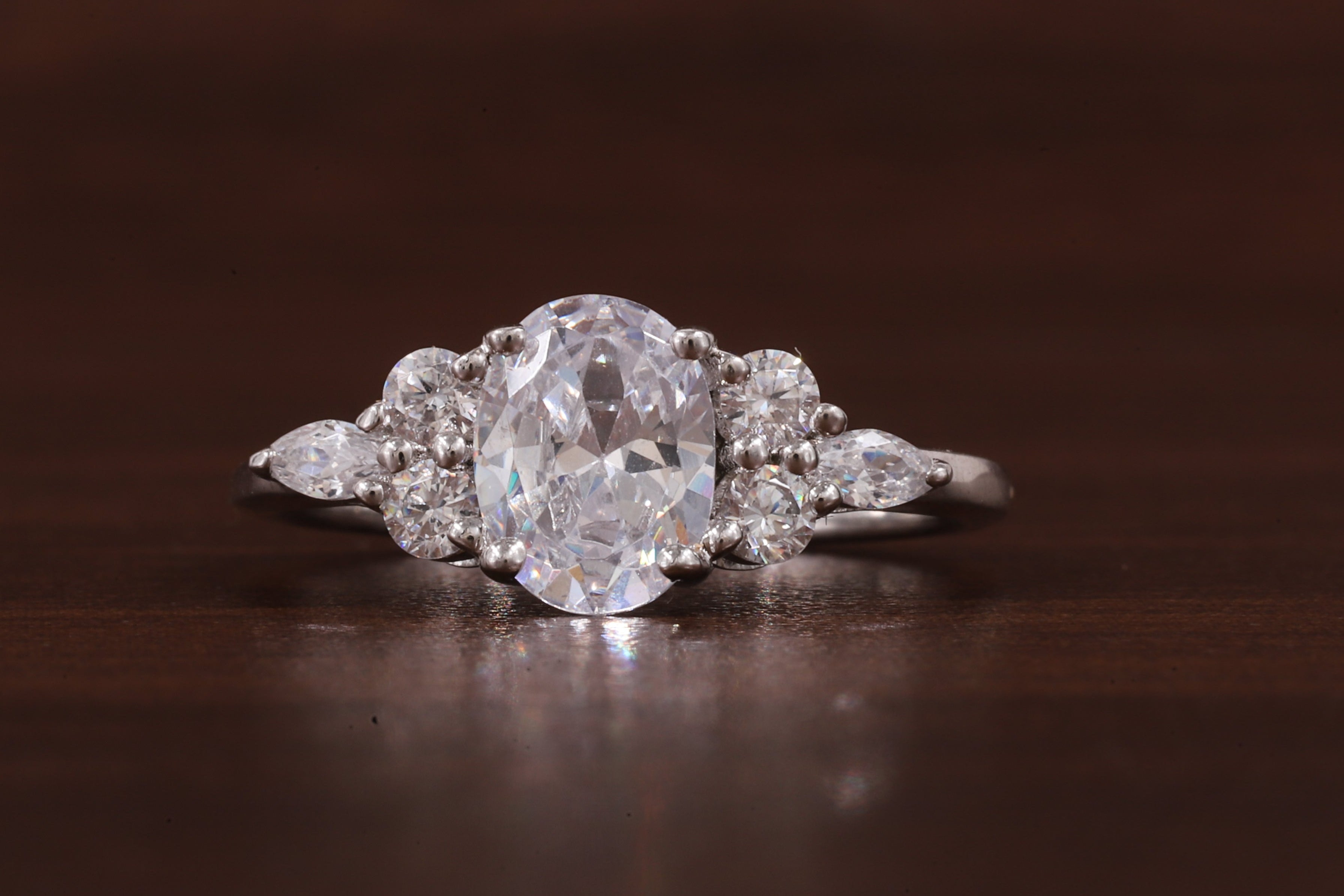 Diamond ring on a wooden surface