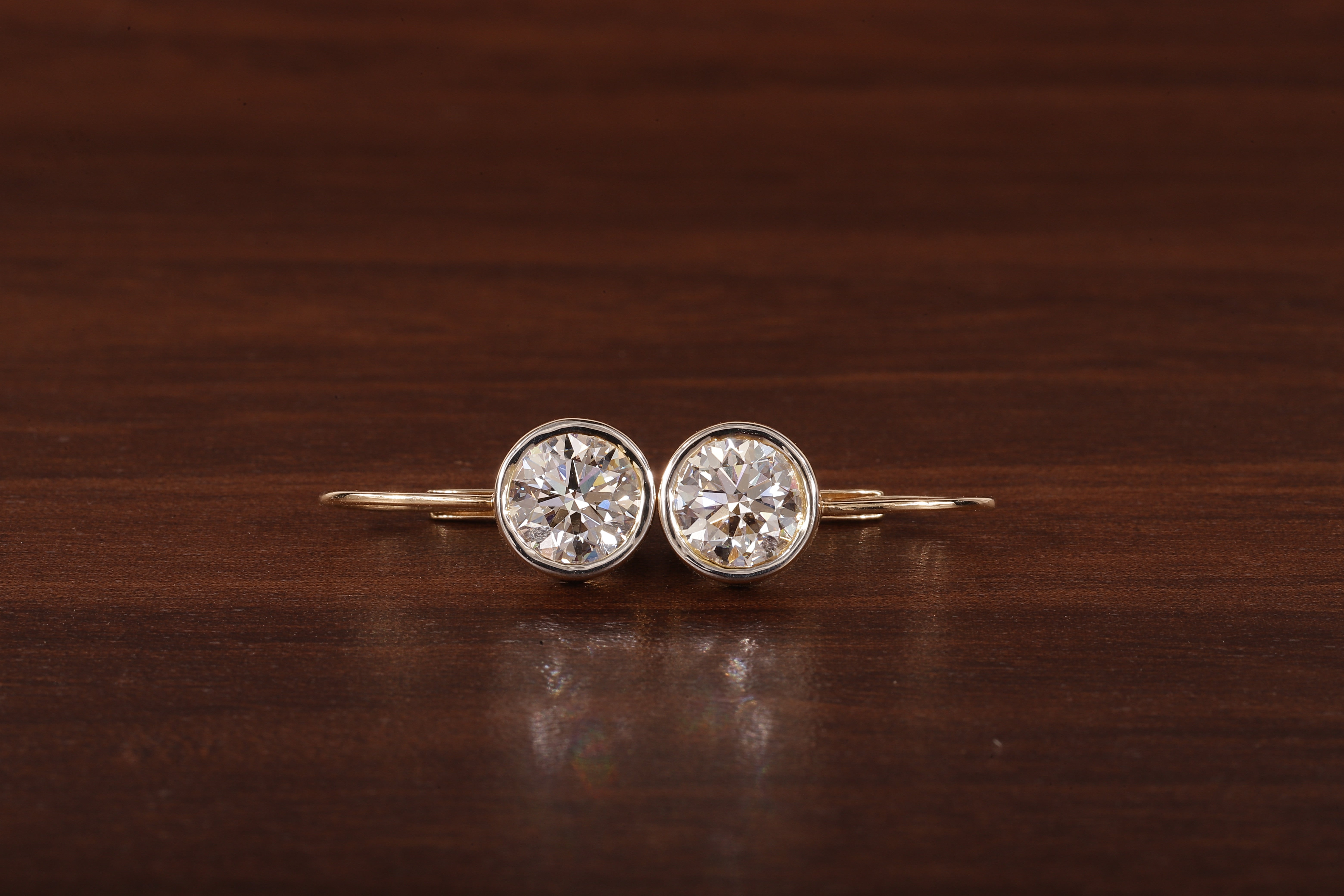 1.5CT Round Moissanite Bezel Set Dangling Earrings in 14K Yellow Gold