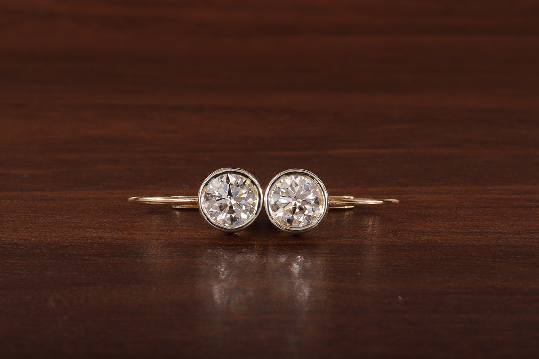 1.5CT Round Moissanite Bezel Set Dangling Earrings in 14K Yellow Gold
