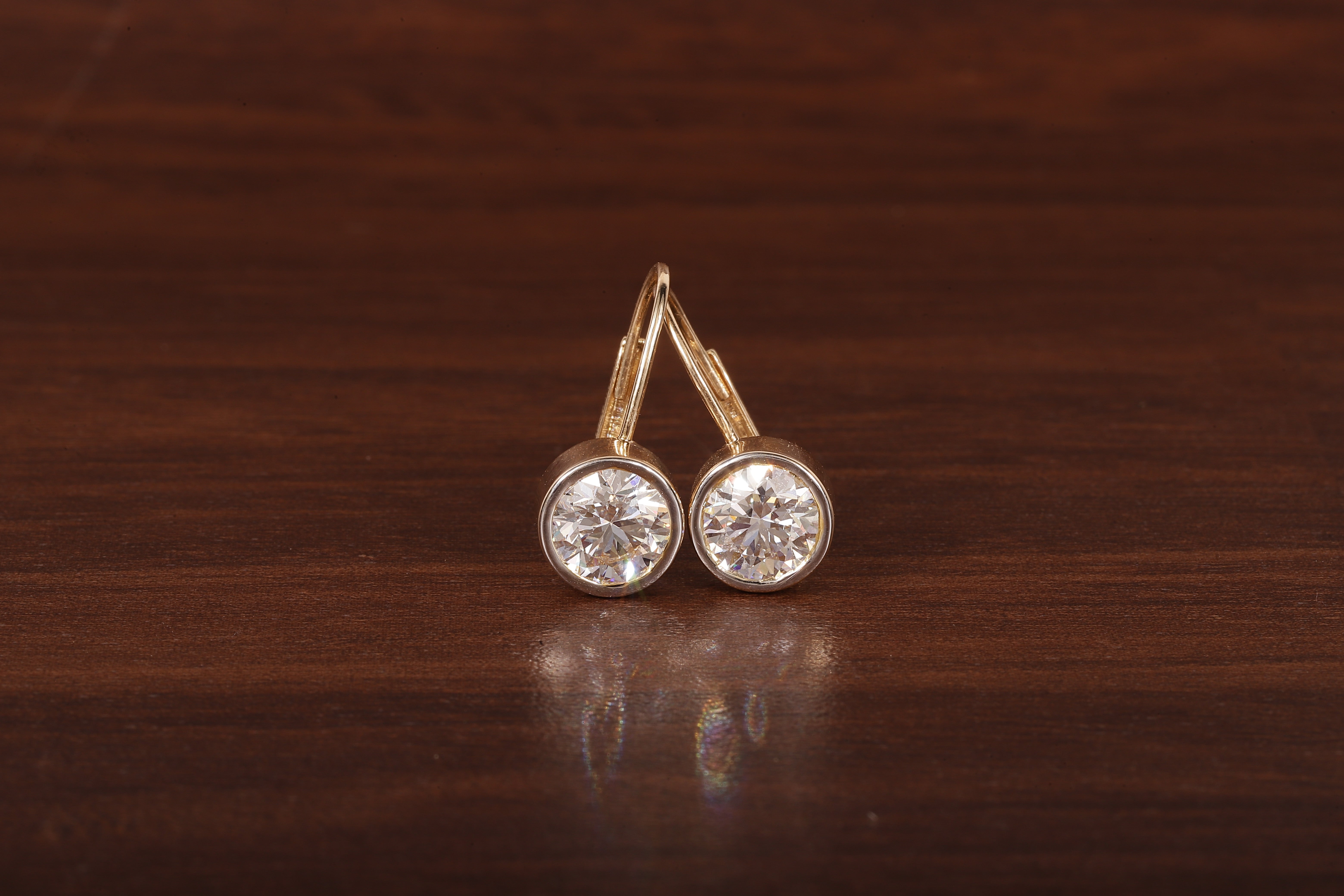 1.5CT Round Moissanite Bezel Set Dangling Earrings in 14K Yellow Gold