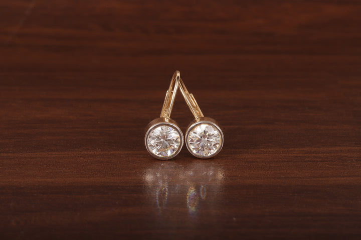 1.5CT Round Moissanite Bezel Set Dangling Earrings in 14K Yellow Gold