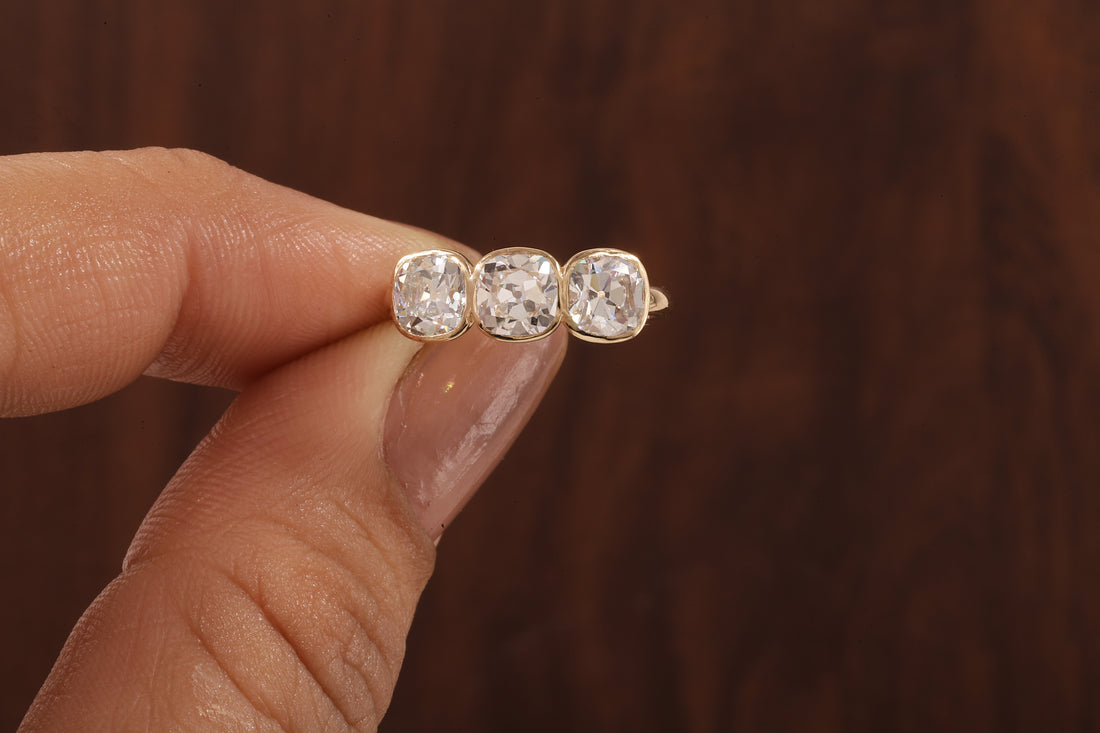 Cushion old European cut Moissanite Three Stone Ring