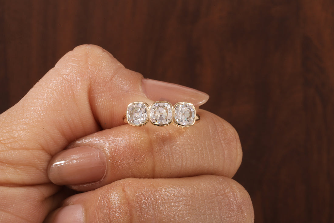 Cushion old European cut Moissanite Three Stone Ring