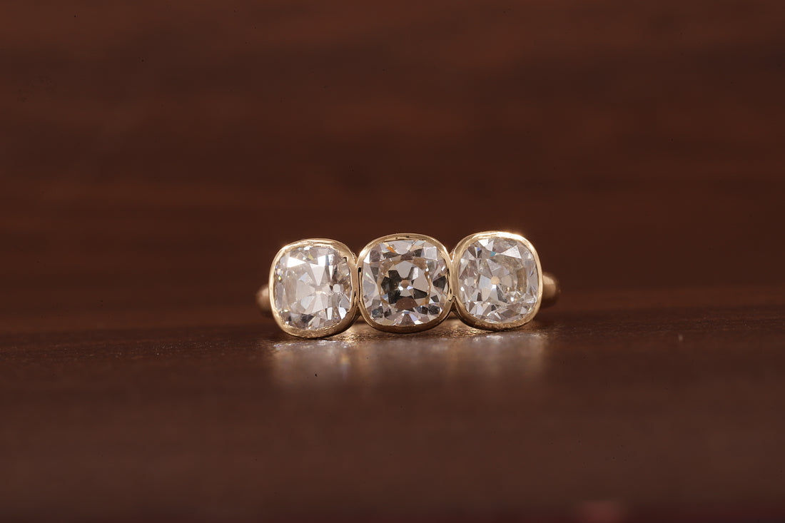 Cushion old European cut Moissanite Three Stone Ring