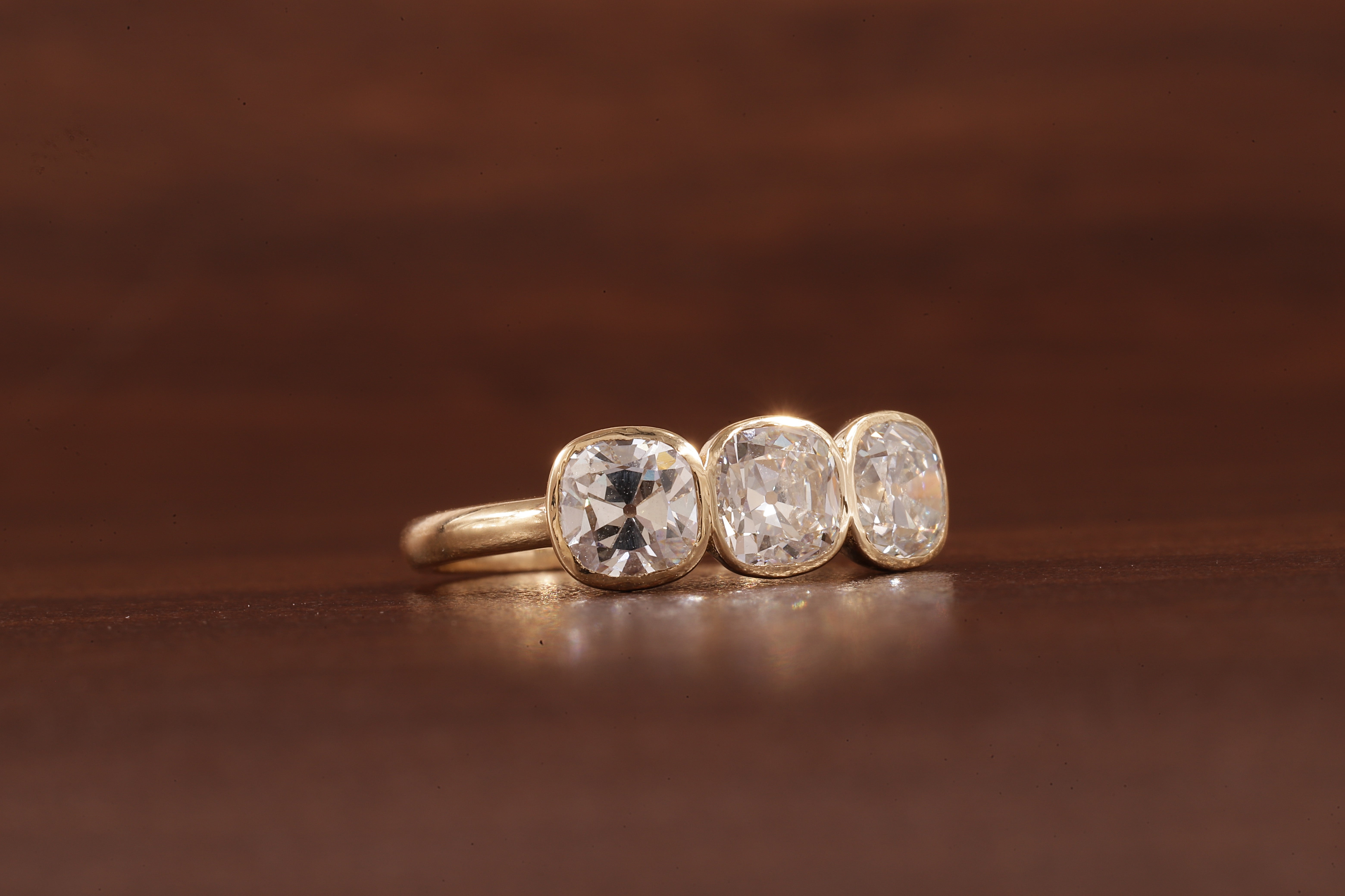 Cushion old European cut Moissanite Three Stone Ring