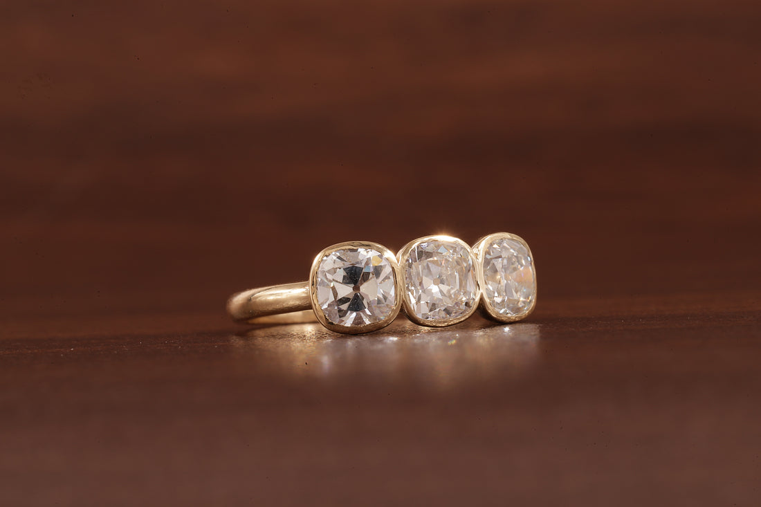 Cushion old European cut Moissanite Three Stone Ring