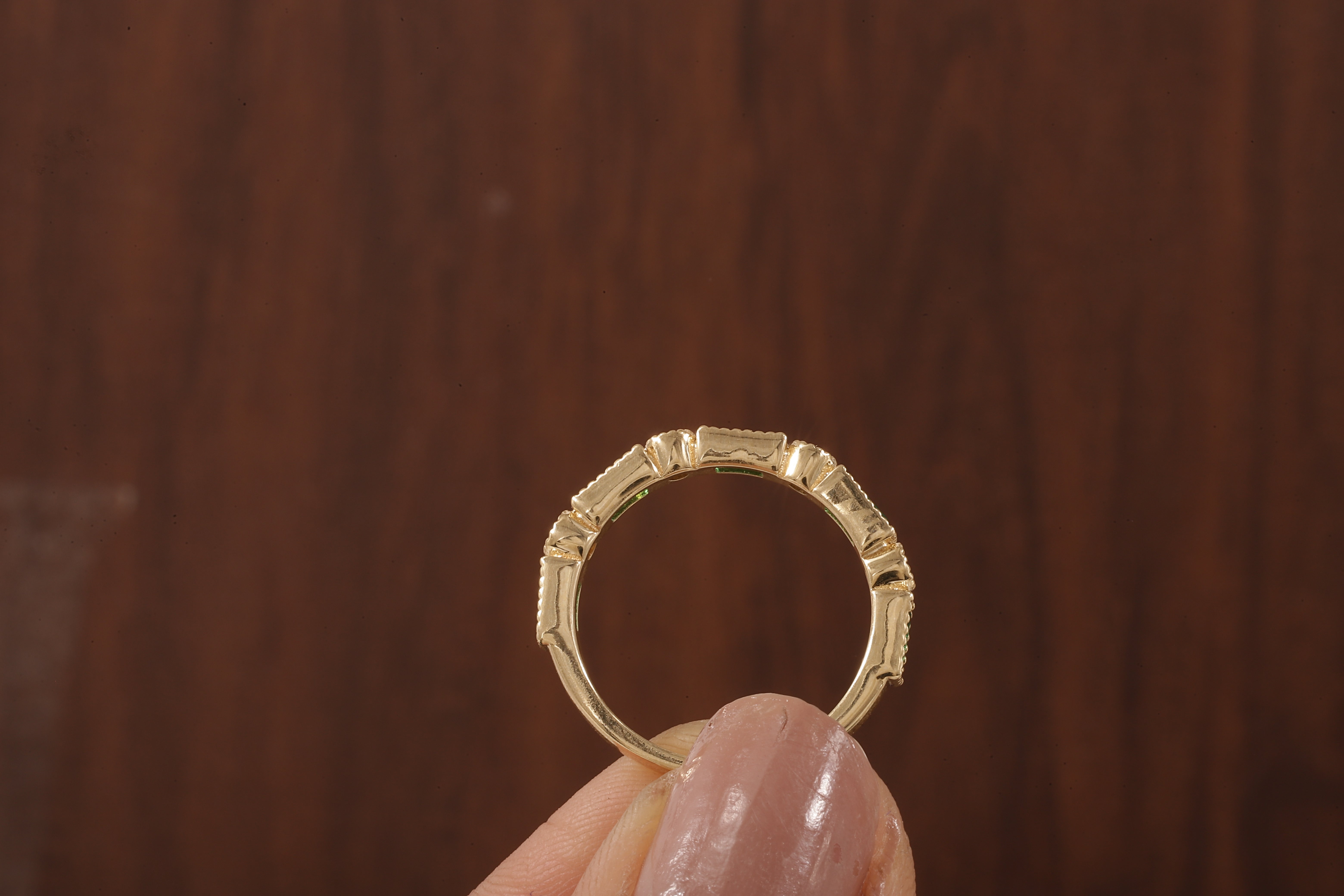 Green baguette and round moissanite milgrain bezel set