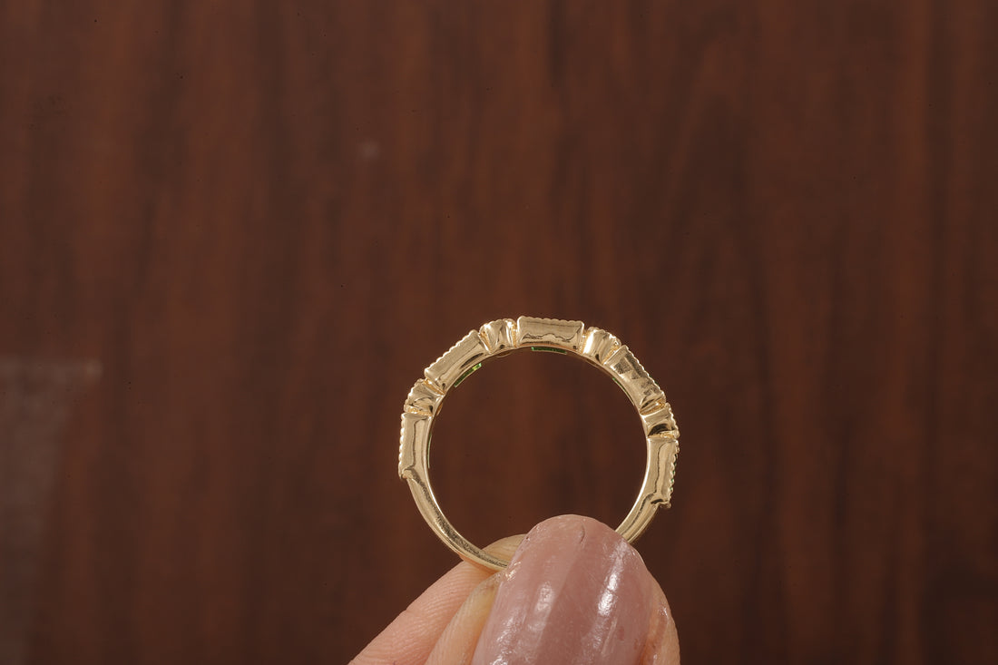 Green baguette and round moissanite milgrain bezel set