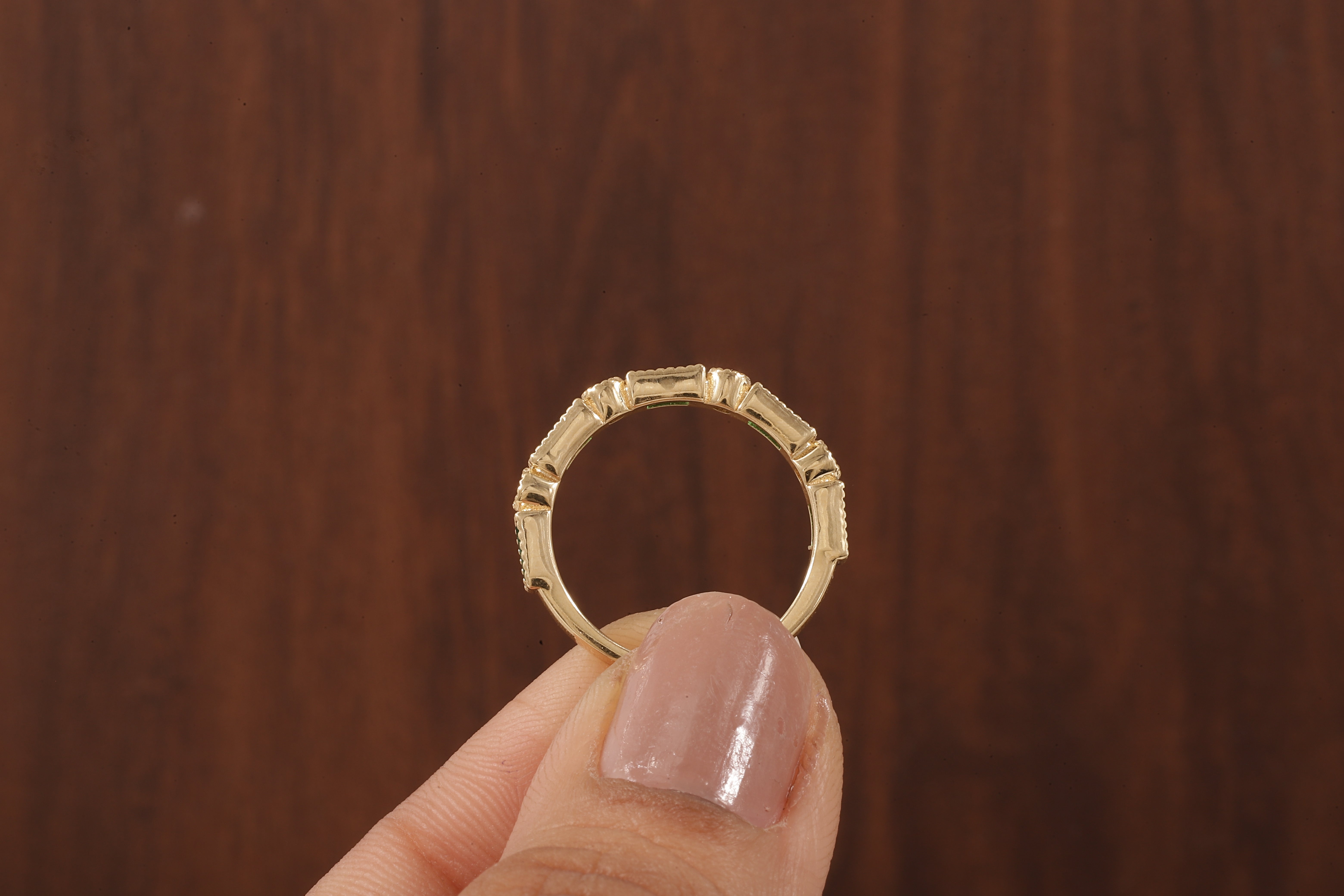 Green baguette and round moissanite milgrain bezel set