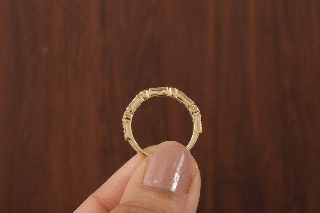 Green baguette and round moissanite milgrain bezel set