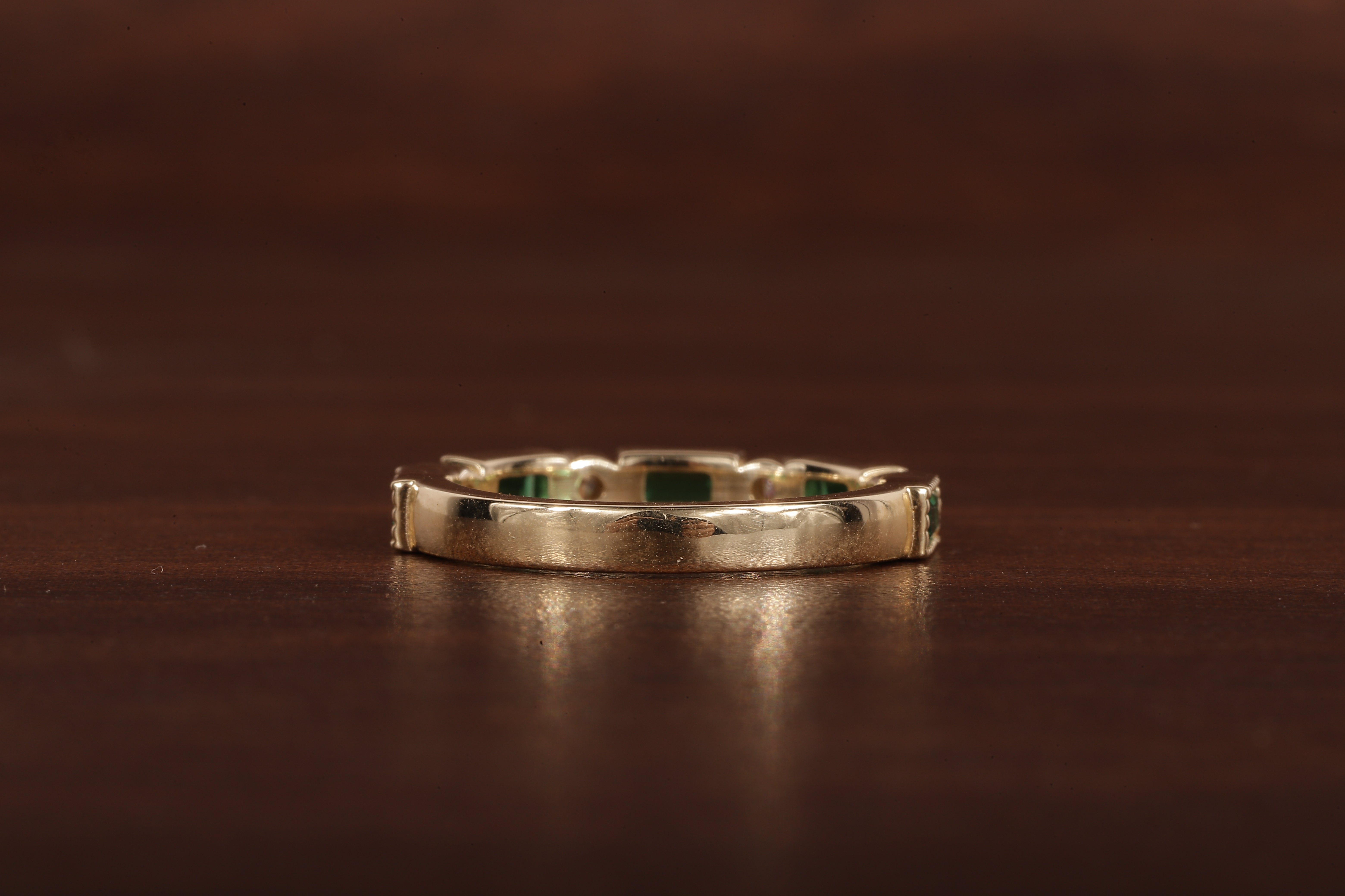 Green baguette and round moissanite milgrain bezel set