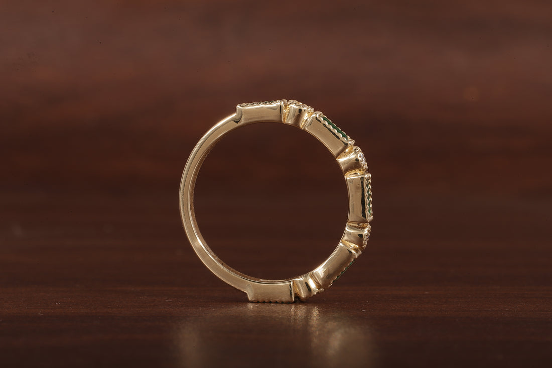 Green baguette and round moissanite milgrain bezel set