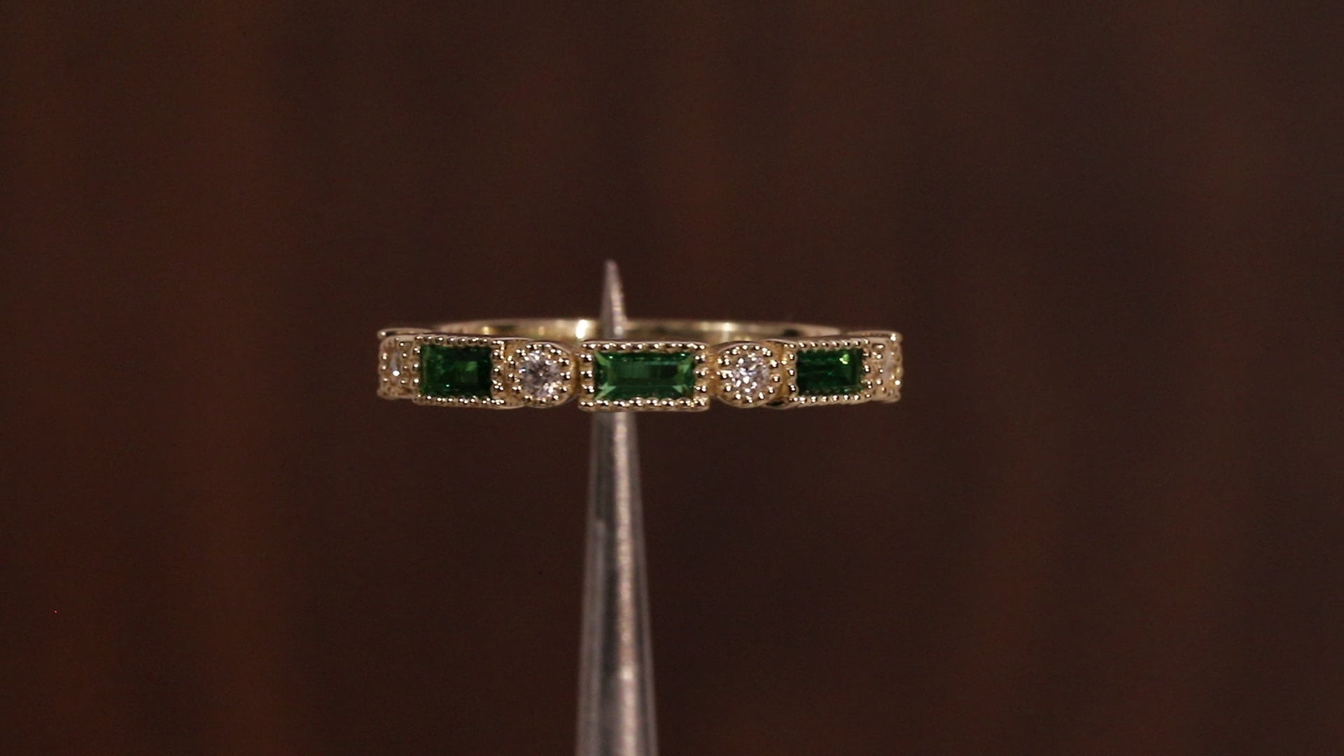 Green baguette and round moissanite milgrain bezel set